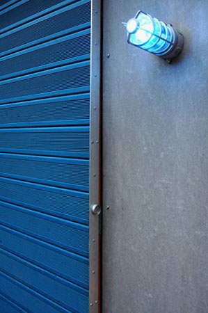 Conception et construction d'un atelier-cabanon intégrant une palissade