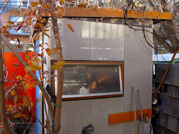 Conception et construction d'un atelier-cabanon intégrant une palissade