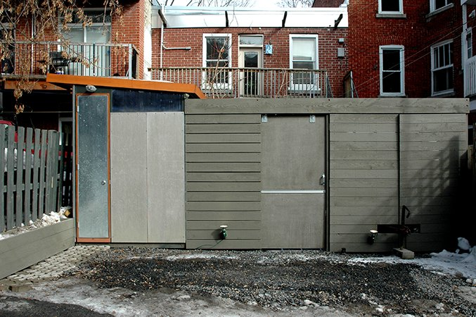 Conception et construction d'un atelier-cabanon intégrant une palissade